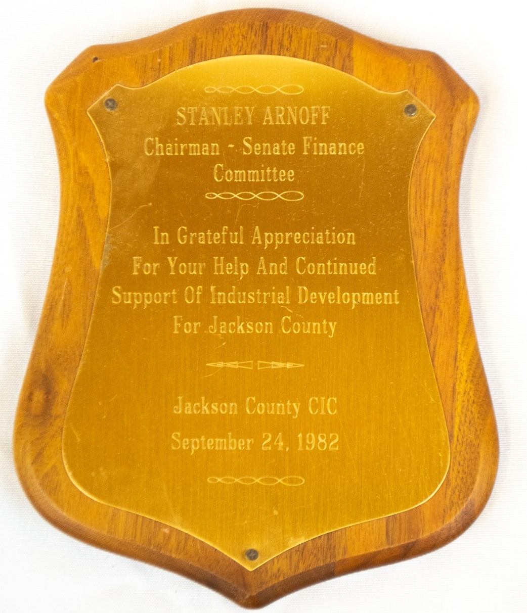 Plaque presented to Stanley Aronoff for Supporting Industrial Development for Jackson County 