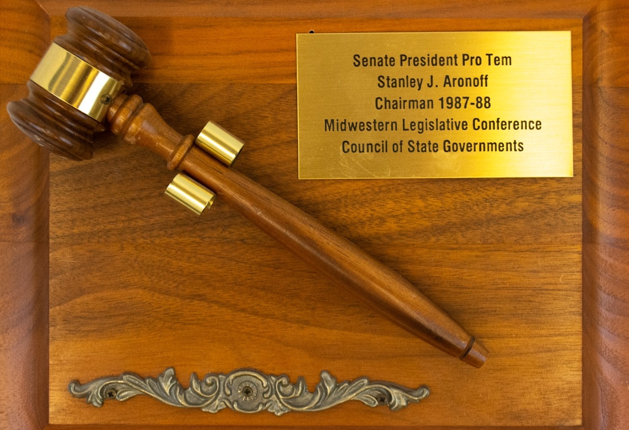 Midwestern Legislative Conference Council of State Governments present a hammer to Senate President Pro Tem Stanley J. Aronoff