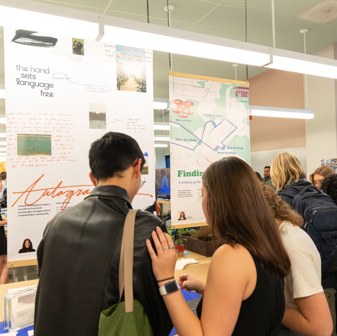 Attendees viewing senior capstone projects at the 2024 DAAPworks Opening Reception.