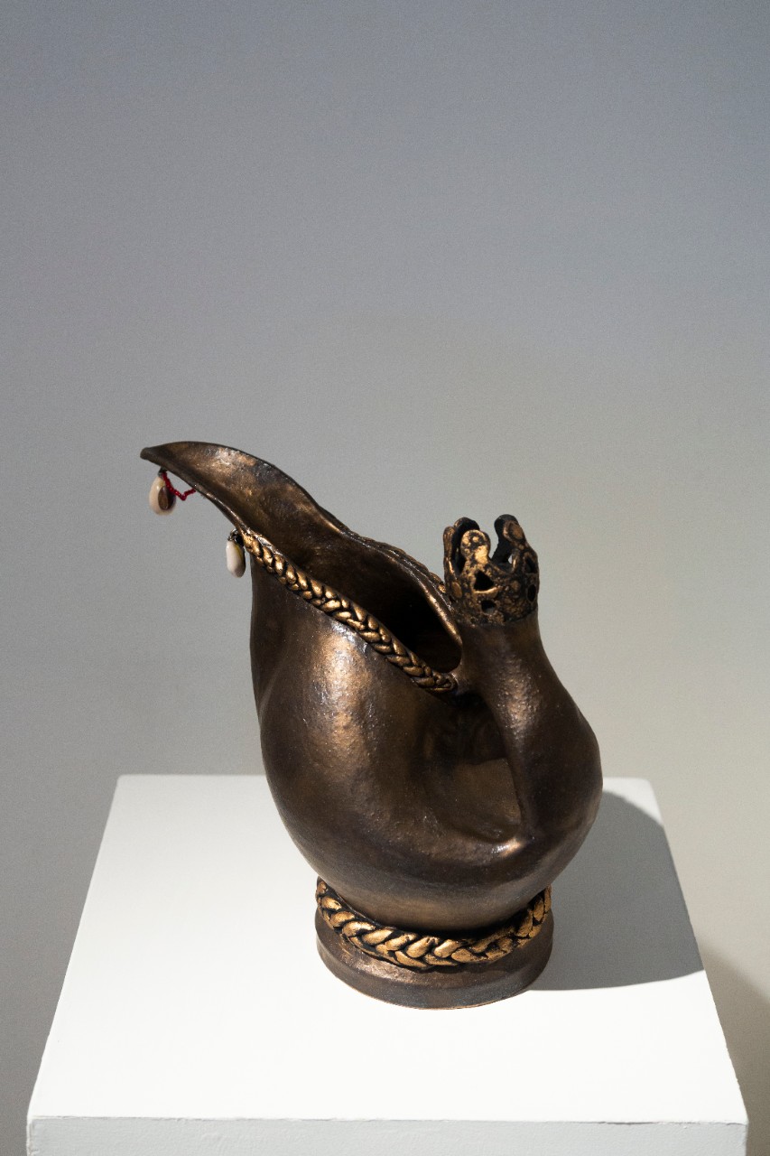 stoneware metallic pouring vessel