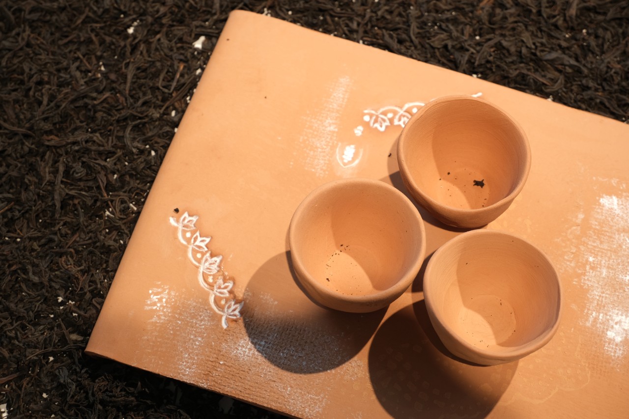 Southern Ice porcelain paper clay, slip, fabric, thread, stain and glaze