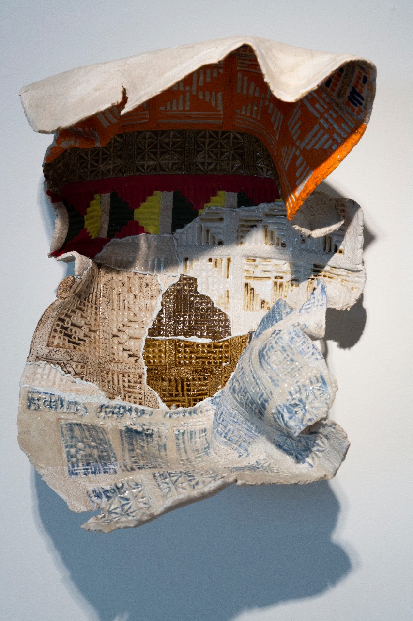 Stoneware, quilted pieces of printed cloth of clay