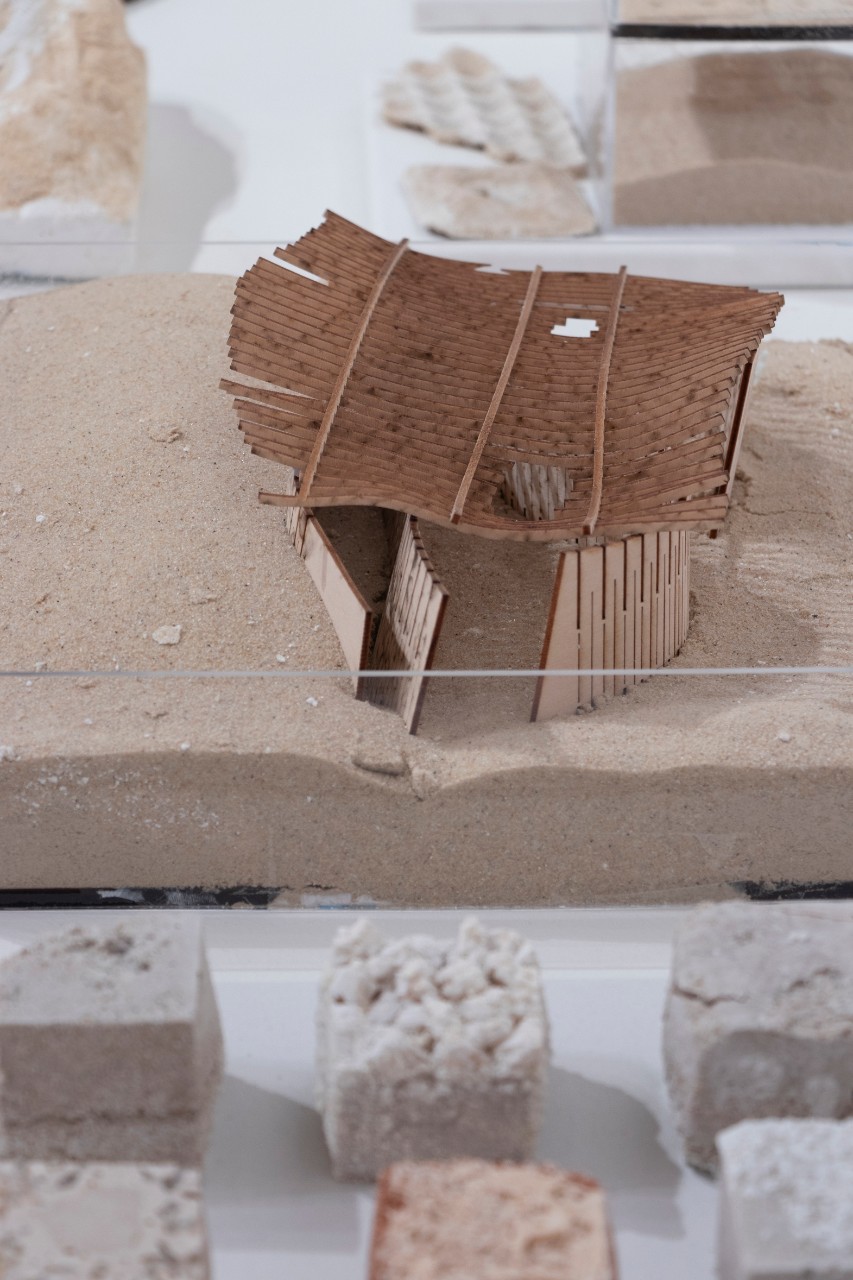 prints on canvas, wood, cardboard and plastic models, sand