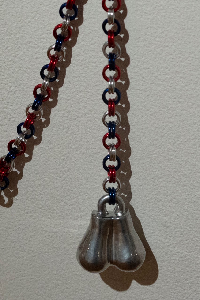 chained porcelain and aluminum balls