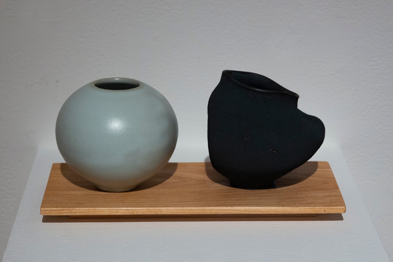 teal and black ceramic bowls