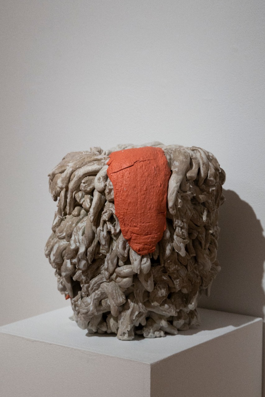 ceramic clumpy bowl with orange tongue