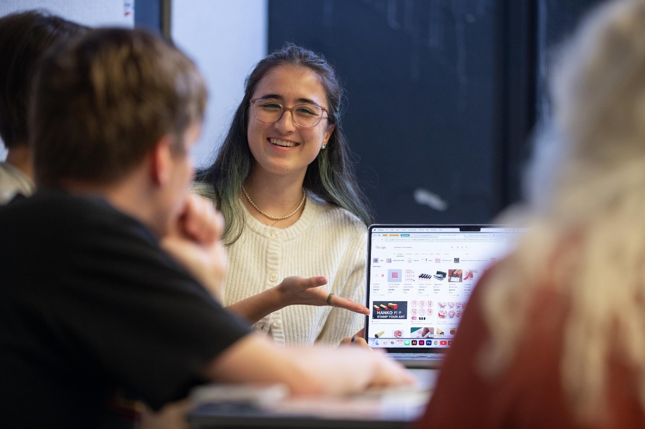 Margaret Weiner teaches a graphic design class in DAAP.