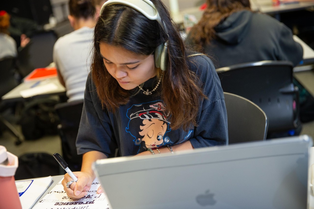 Margaret Weiner teaches a graphic design class in DAAP.